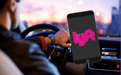 Lyft app on smartphone in car
