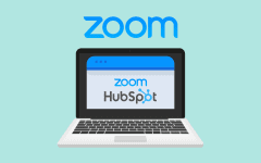 Laptop displaying Zoom and HubSpot logos